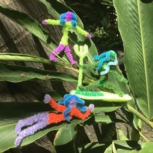 Pipe cleaner characters at a Sheraton Surf Art Activity