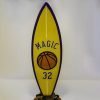 Team Spirit little surfboard model on wooden stand
